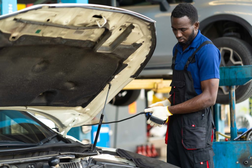 obd code checking done by male mechanic