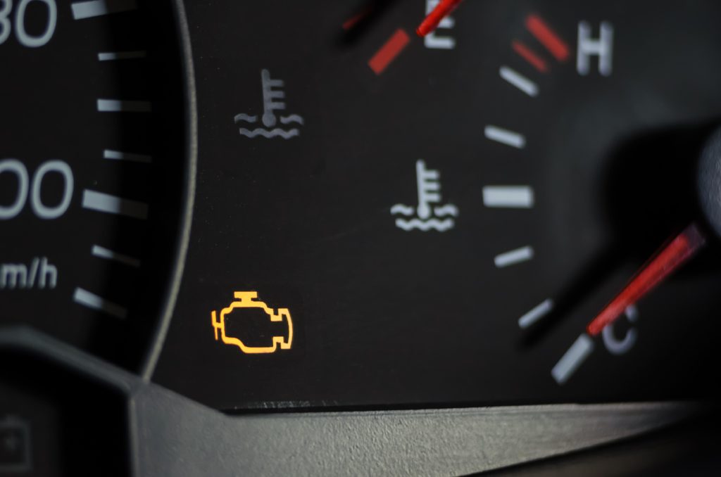 check engine light on as a common symptom of P051B