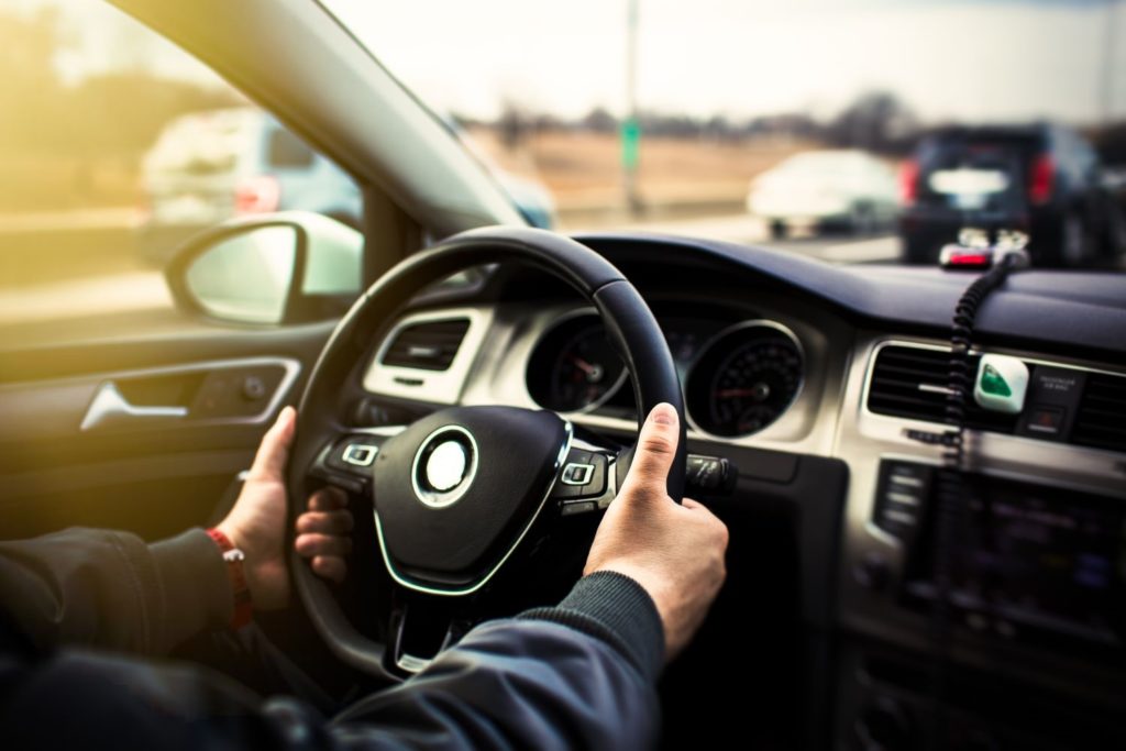 driver holding the wheel