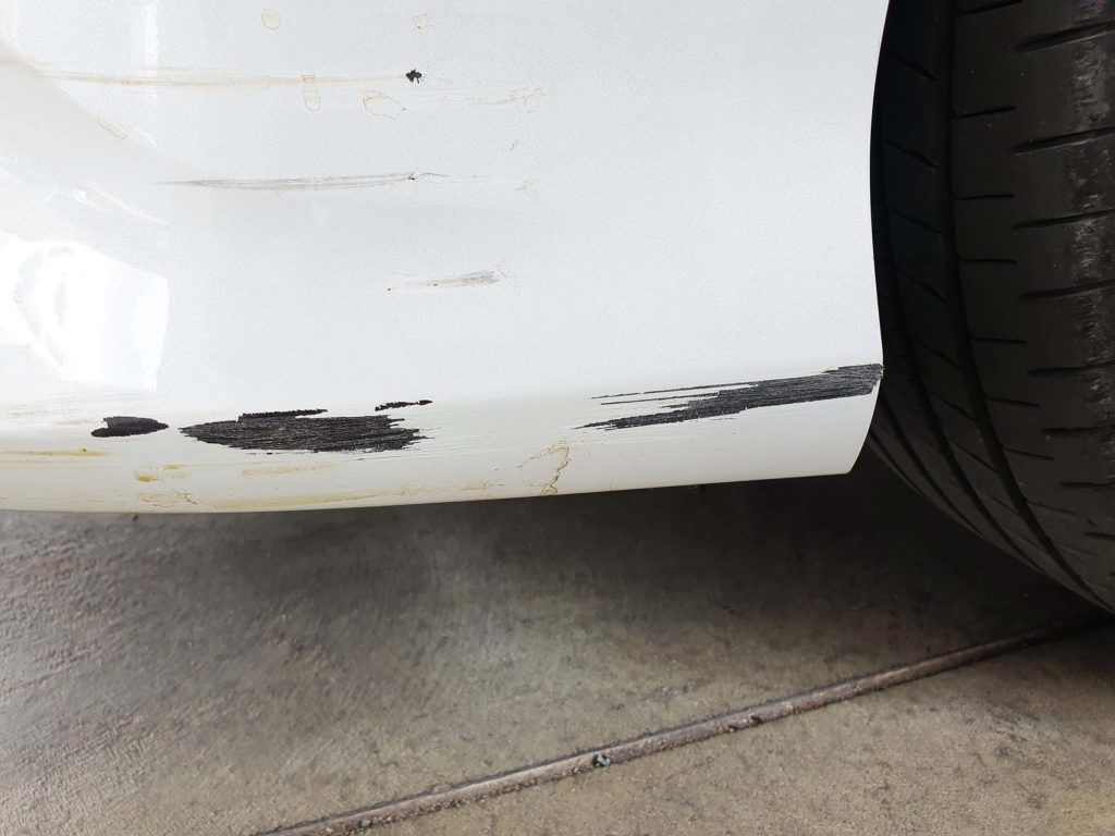 car rear with scratch