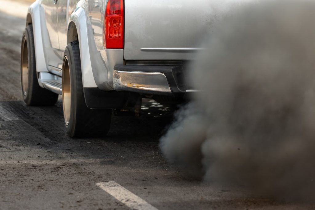 black exhaust smoke of a car