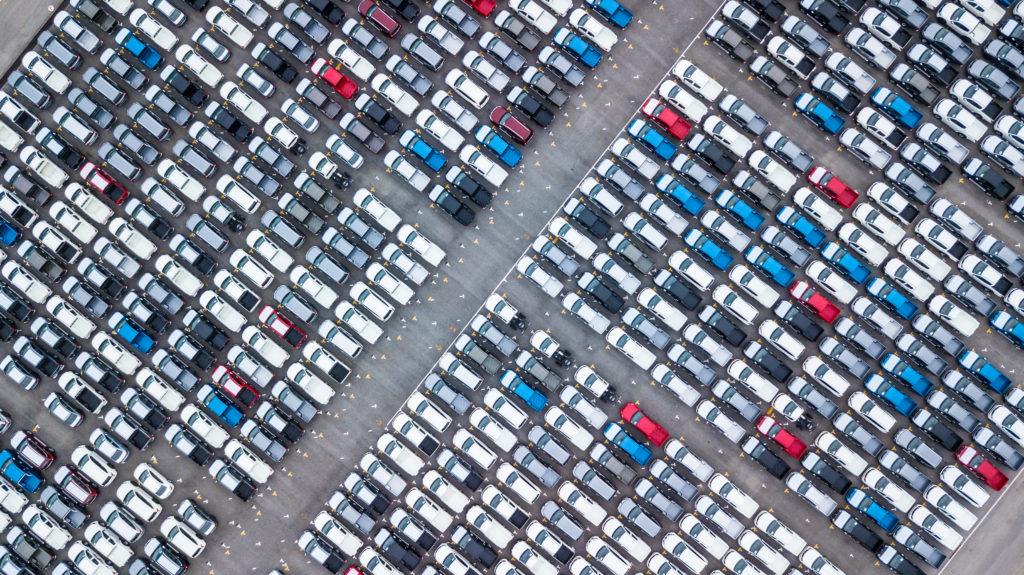 boring colored cars in parking lot