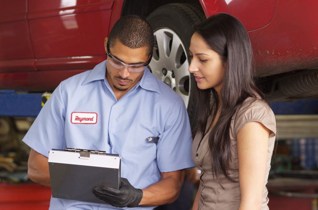 consulting a car mechanic