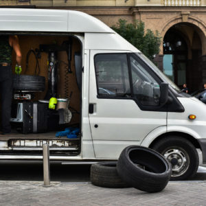 mobile mechanic replacing tires