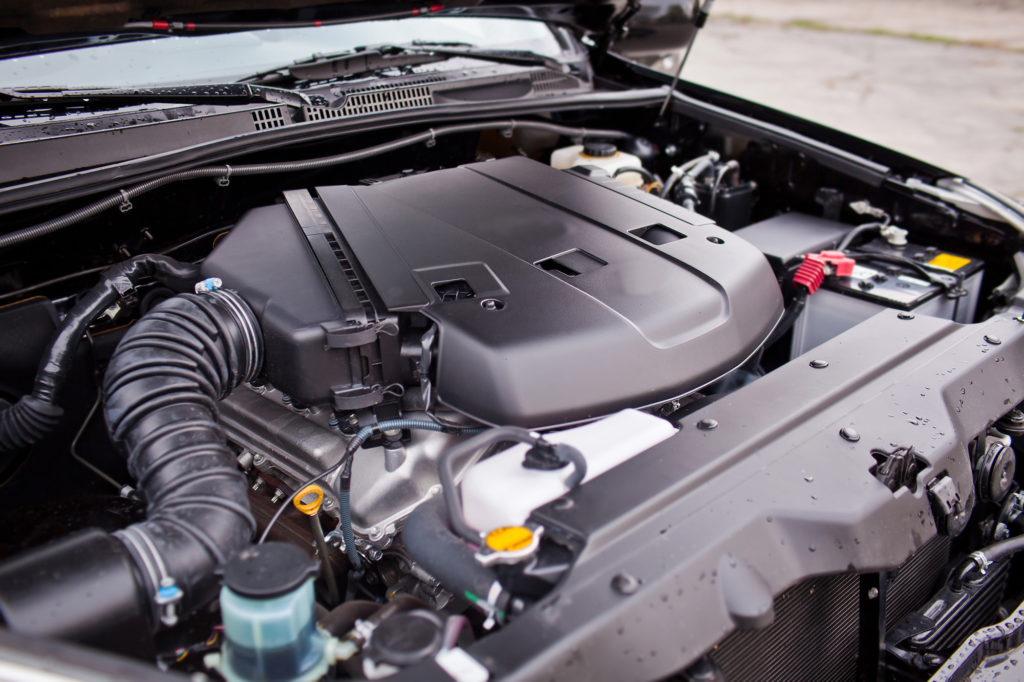 car v8 engine covered with plastic