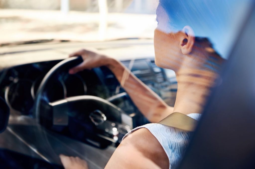 female driver in a car