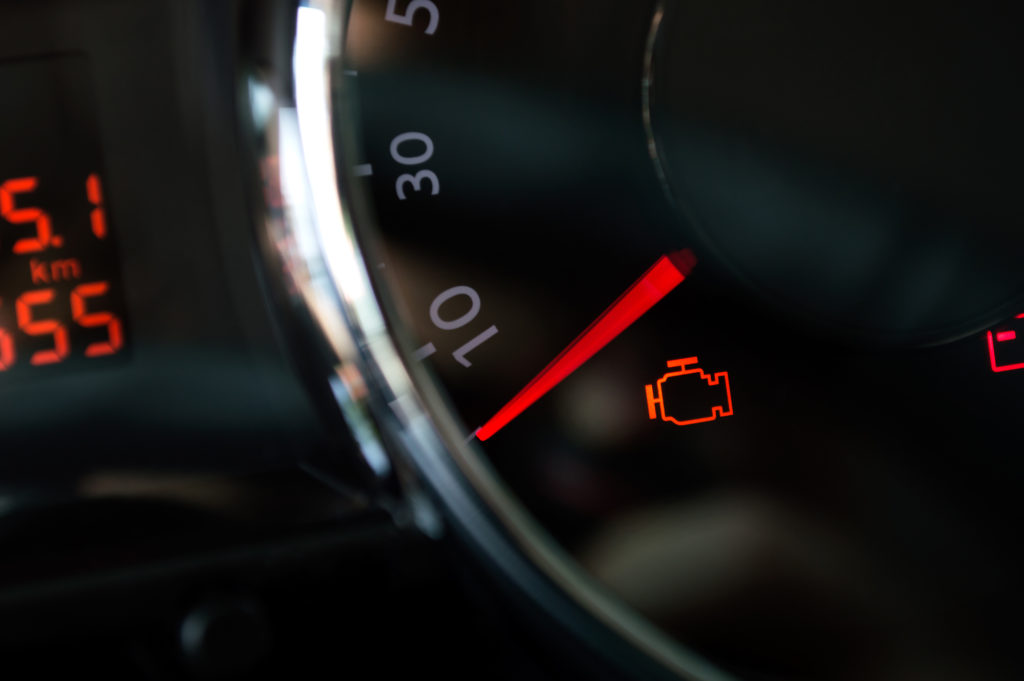 illuminated check engine light focused