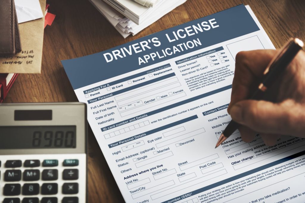 filling out a driver's license application