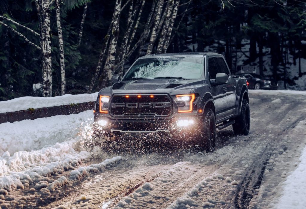 gray ford f-150 truck on a snowy road