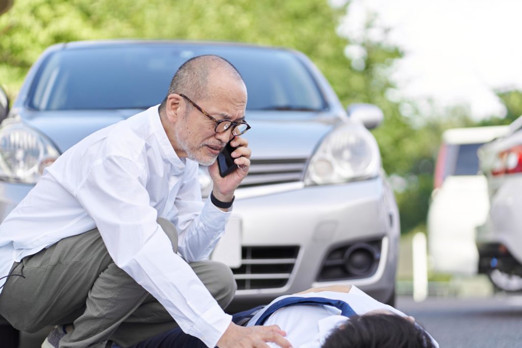 old man calling an ambulance