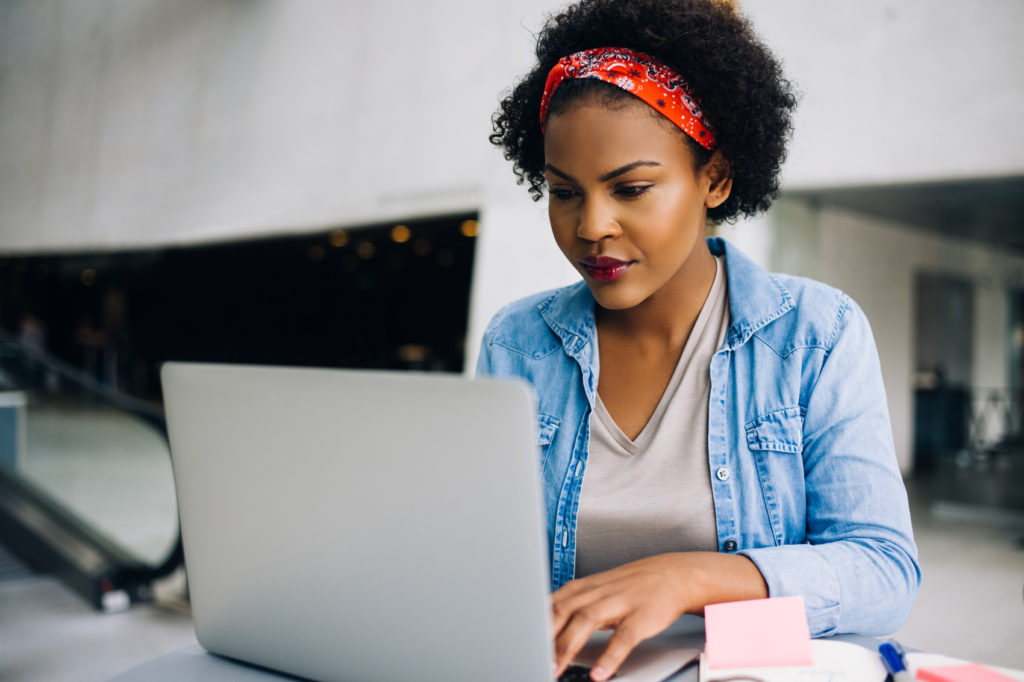 woman taking driving education online