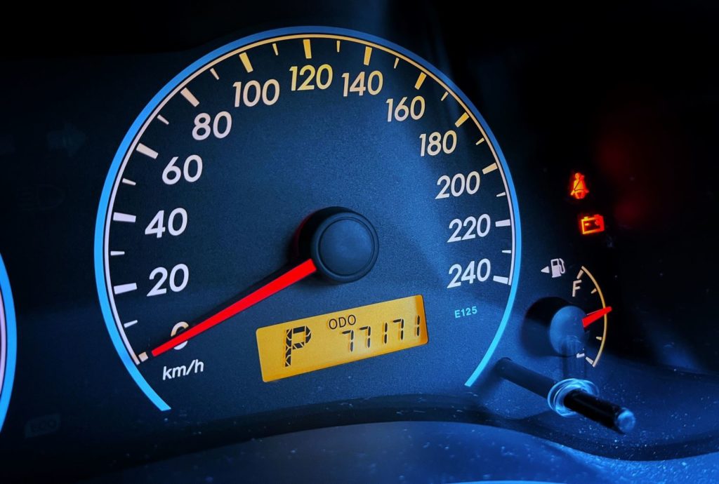 car dashboard with warning lights on