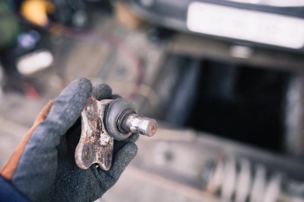 holding a car ball joint