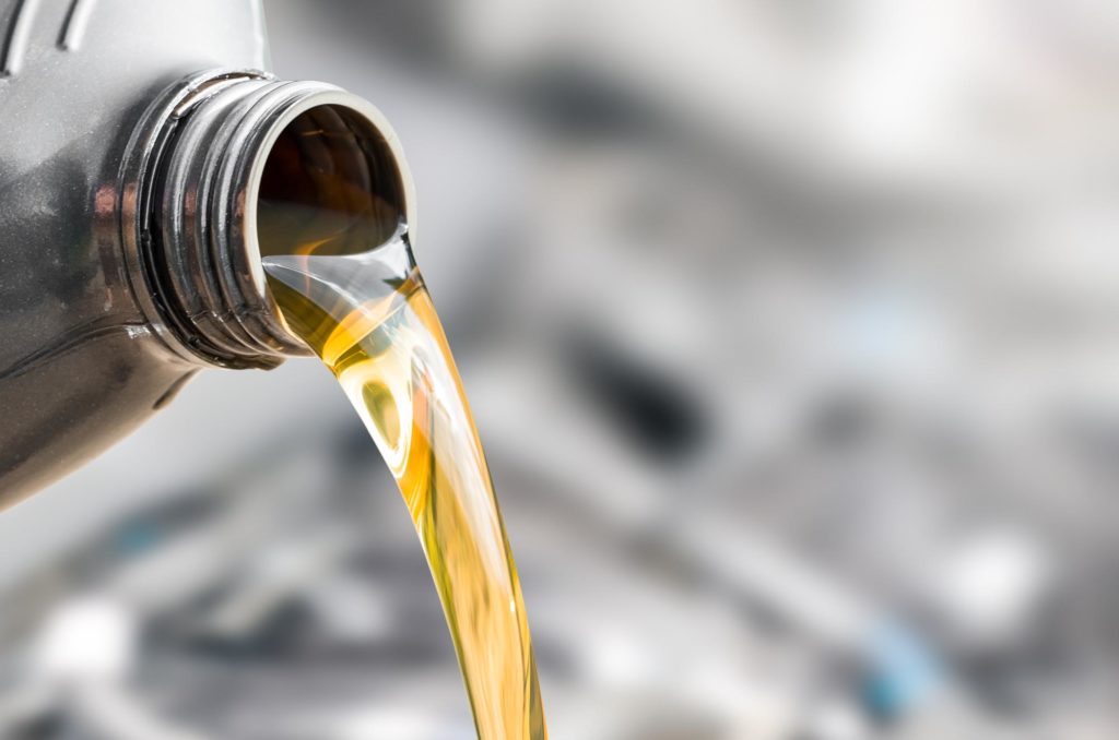 oil change pouring of car oil