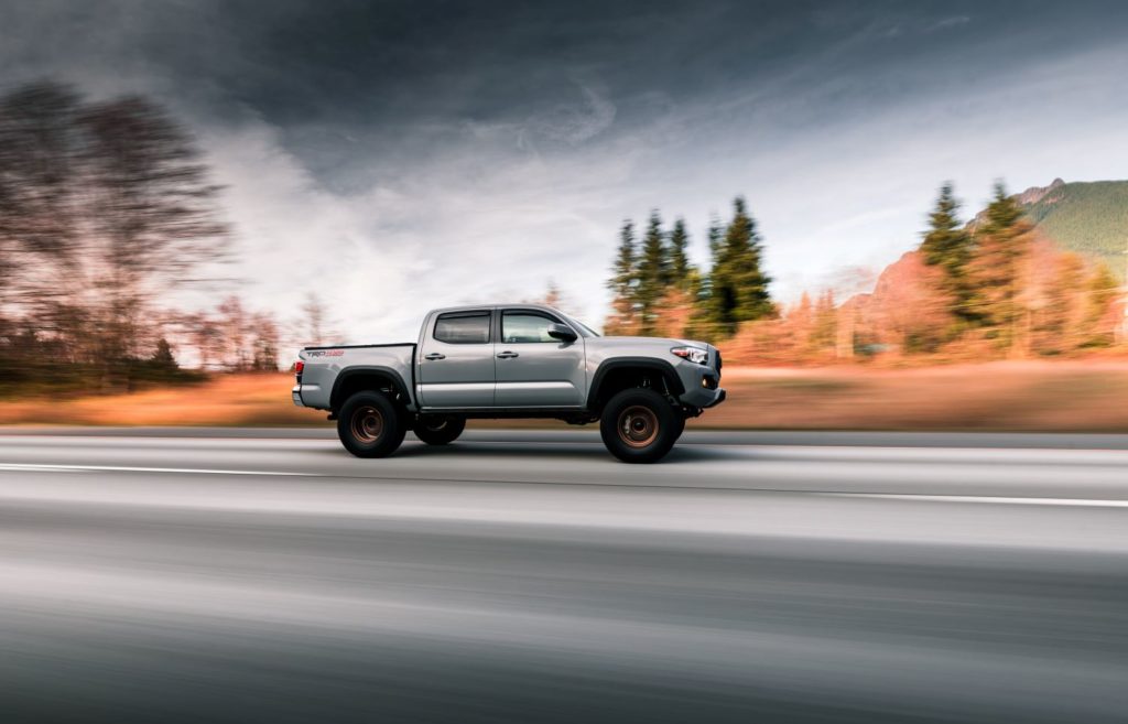 toyota tacoma driving on a highway