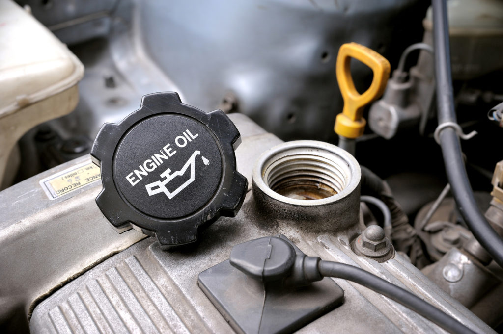 engine oil cap on top of car engine