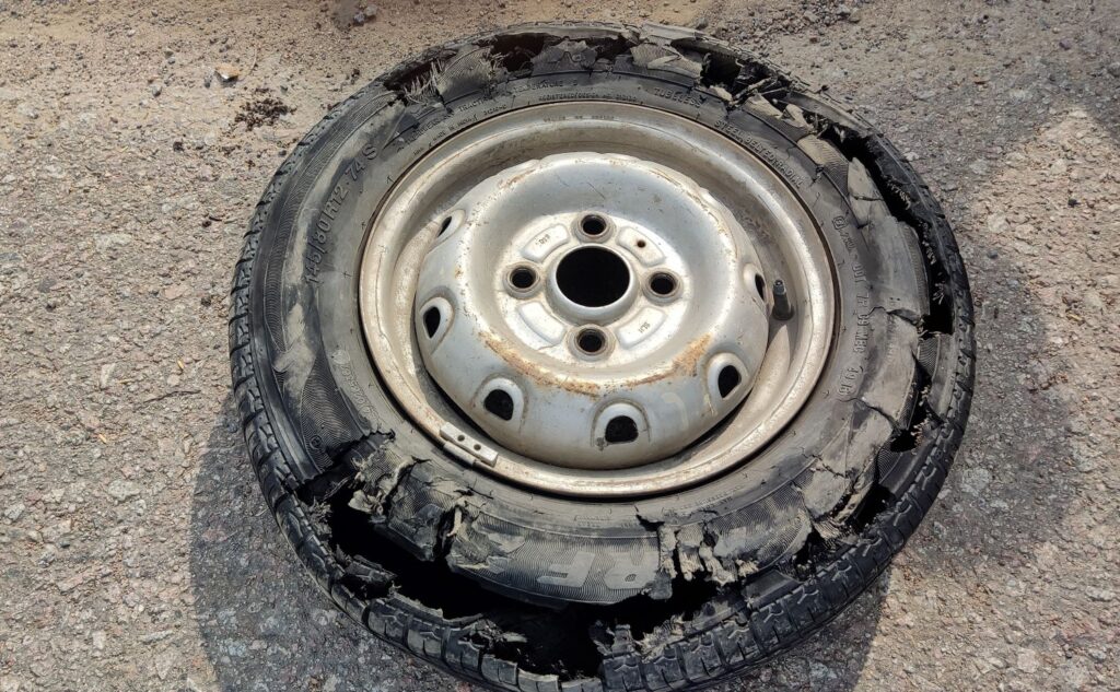 an image of a blown out tire