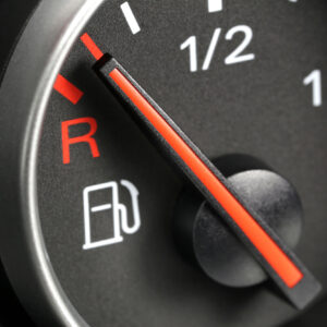 car fuel gauge nearing empty