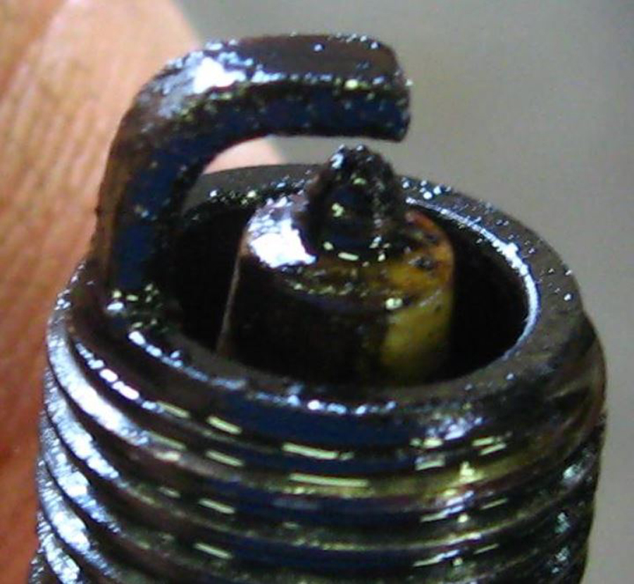 oil clogged sparks plug tip