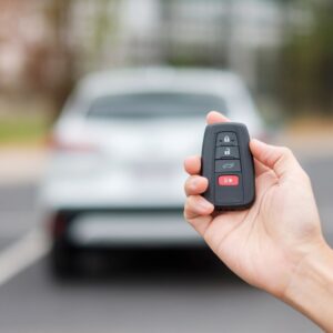 hand holding a key fob