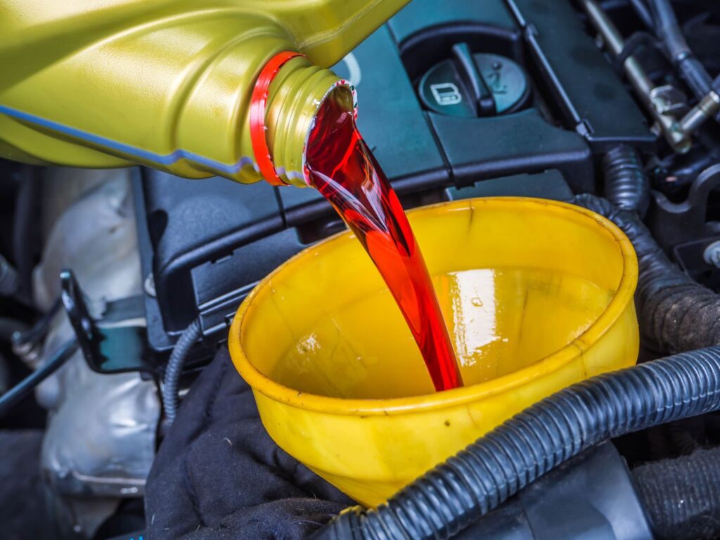 pouring transmission fluid