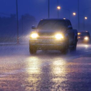 driving in the rain with headlights on