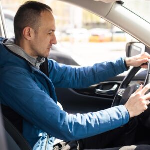 man performing stop and go driving