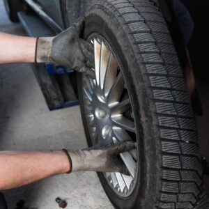 mechanic inspection car wheel rim