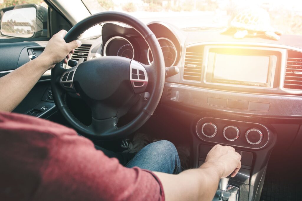 man driving a vehicle