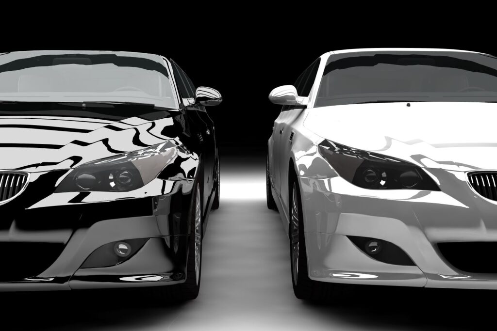 black and white car side by side