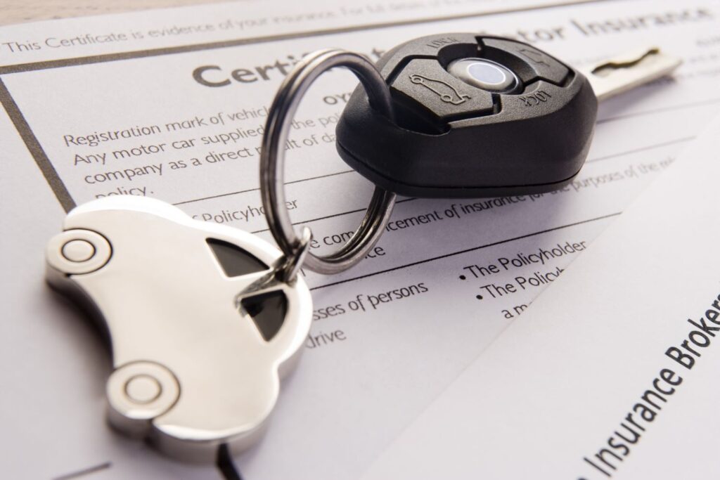 car keys and car insurance contract