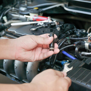 inspecting car fuel injector to avoid issues