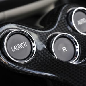 modern car safety features buttons focusing on launch control