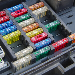 Car,Fuse,Box,Closeup.,Multiple,Rows,Of,Different,Fuses,,One