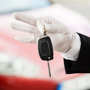 valet driver holding a car key