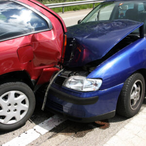 two cars front and rear crumpled