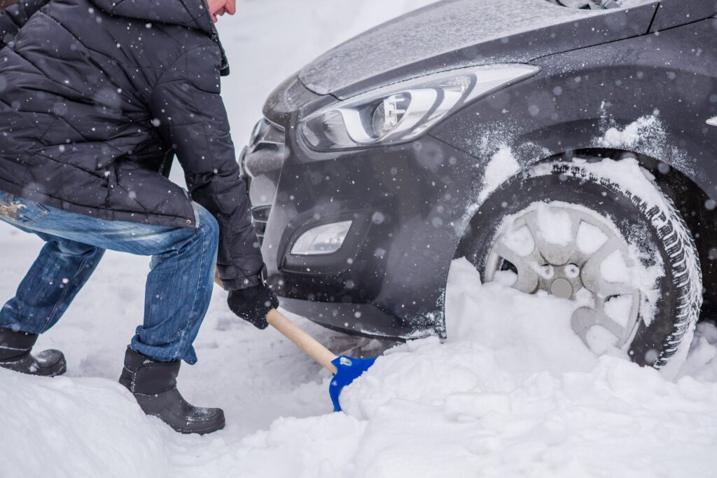 clearing path after car got stuck in snow