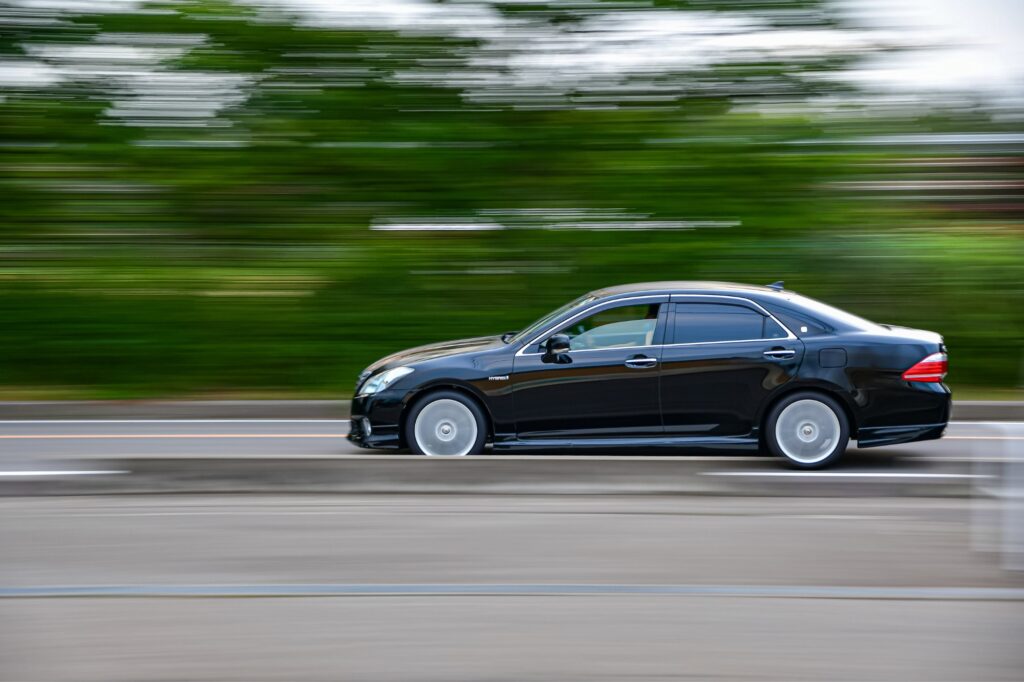 panning shot of a moving car