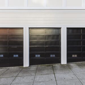 3 black car garage doors