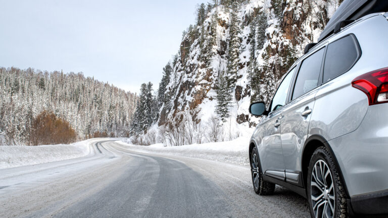 car travel through snowy terrain