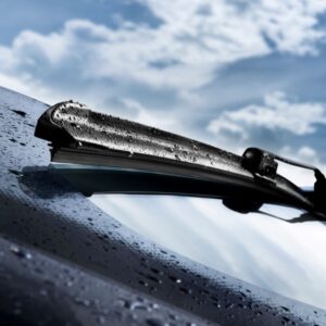 close up shot of a windshield and wiper blades