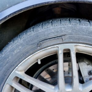 image of a worn tire sidewall