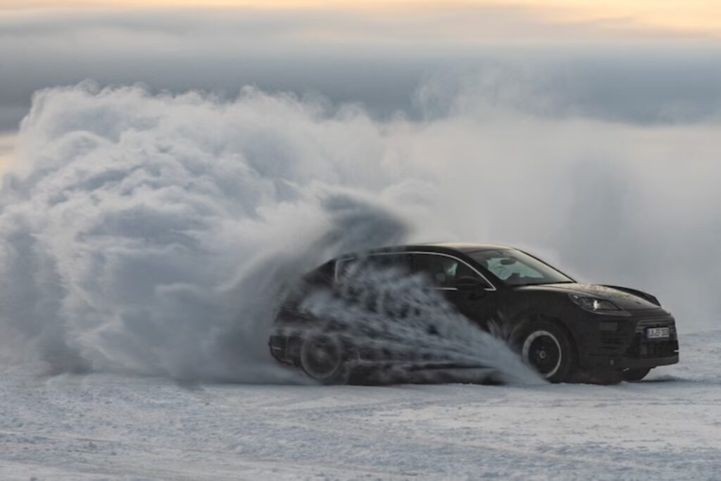 image of a 2024 porsche macan ev prototype on snow