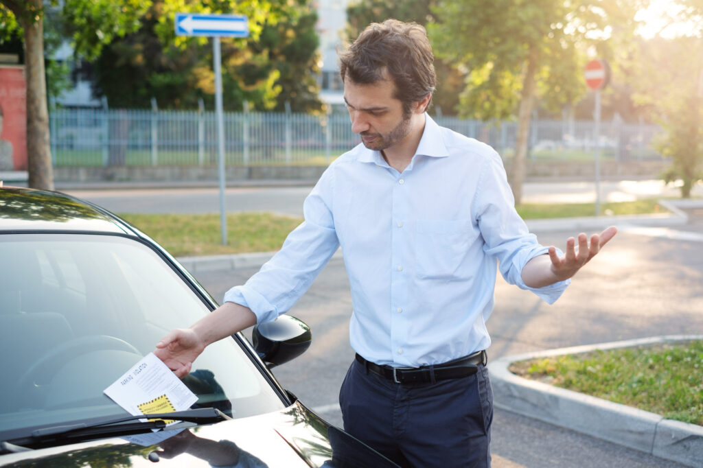 male driver got parking ticket violation