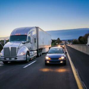 car next to a semi truck