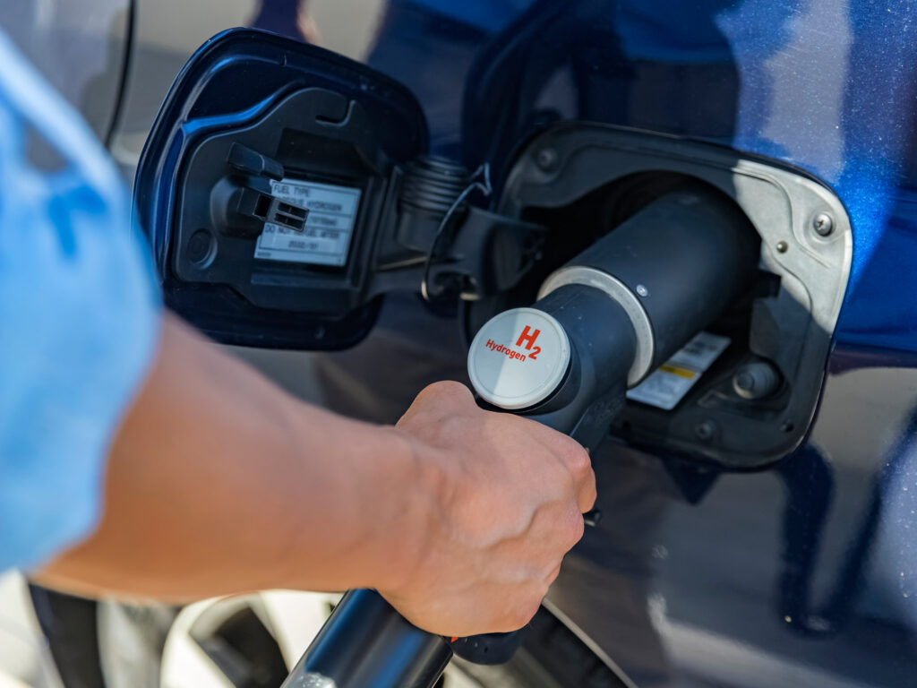 refueling car at hydrogen fuel station