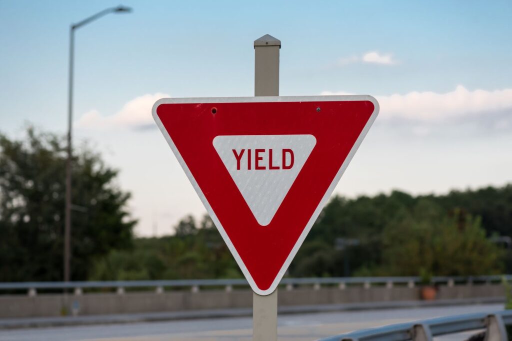 close up shot of a yield road sign