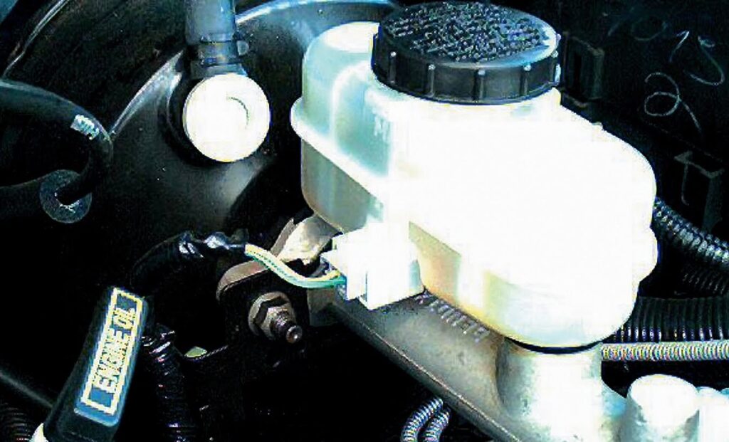 brake master cylinder is typically located inside your engine bay