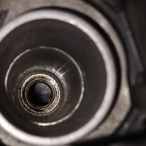 close up shot of a spark plug hole