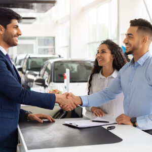 buying new car at car dealership